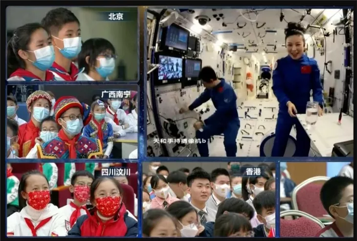 Astronauts aboard the future Chinese orbiting station module give a lecture from space